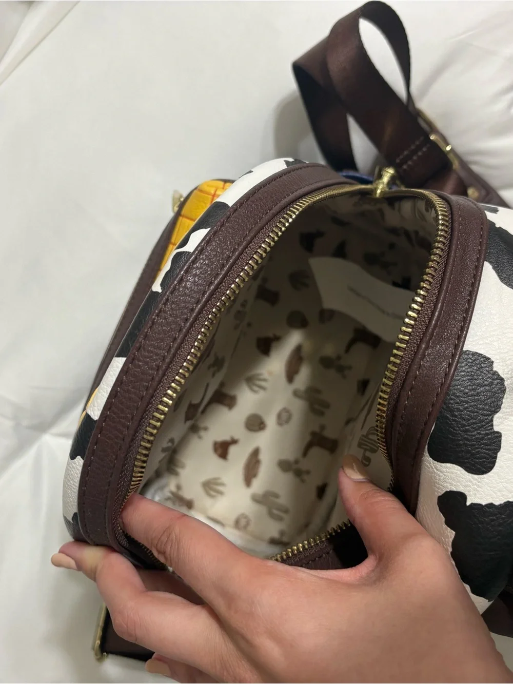 Loungefly Woody-Inspired Mini Backpack in Blue, Yellow, Brown, White, Black